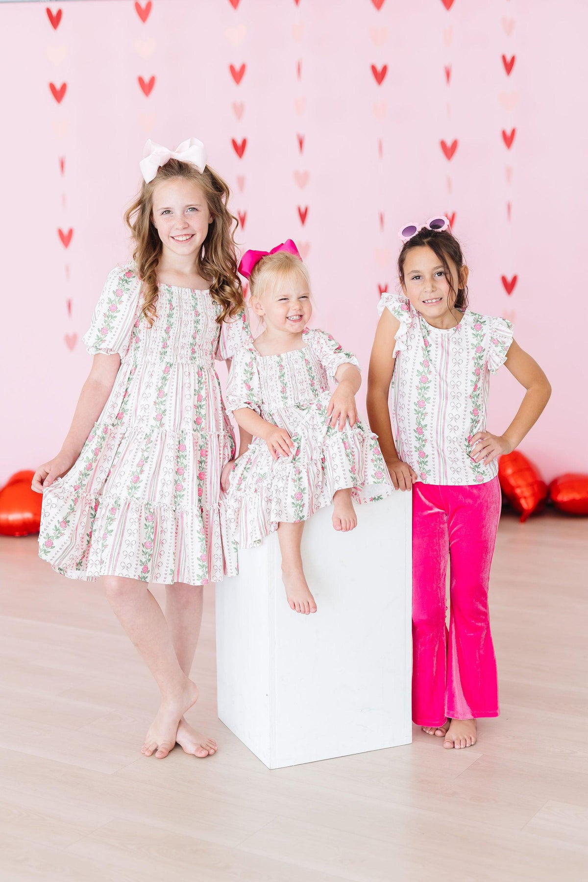 Mila & Rose ® Rosebud Bows Smocked Ruffle DressEveretts Place