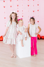Mila & Rose ® Rosebud Bows Smocked Ruffle DressEveretts Place