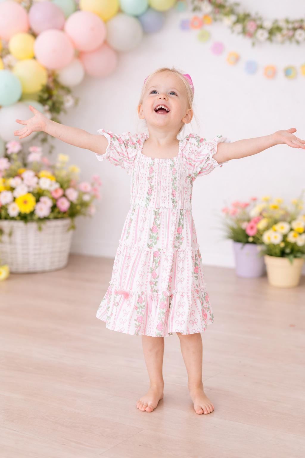 Mila & Rose ® Rosebud Bows Smocked Ruffle DressEveretts Place