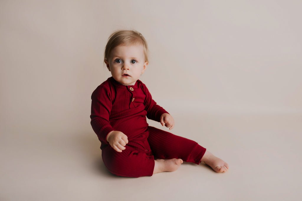Three Little Tots Ruby Red Baby Ribbed Playsuit with pockets - 