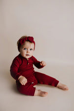 Three Little Tots Ruby Red Baby Ribbed Playsuit with pockets - 