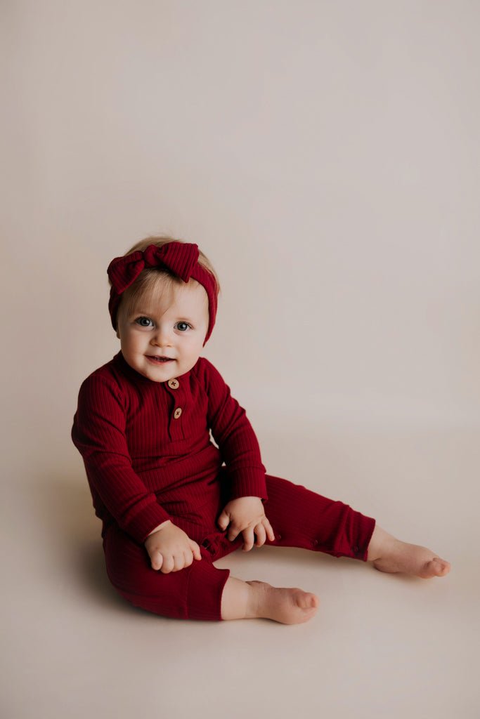 Three Little Tots Ruby Red Baby Ribbed Playsuit with pockets - 
