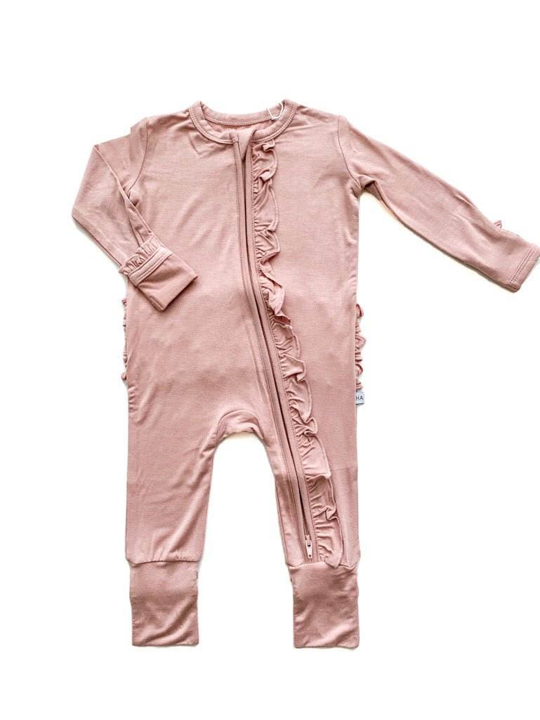 Dusty pink ruffle zipper one piece baby outfit in bamboo fabric with fold-over cuffs.