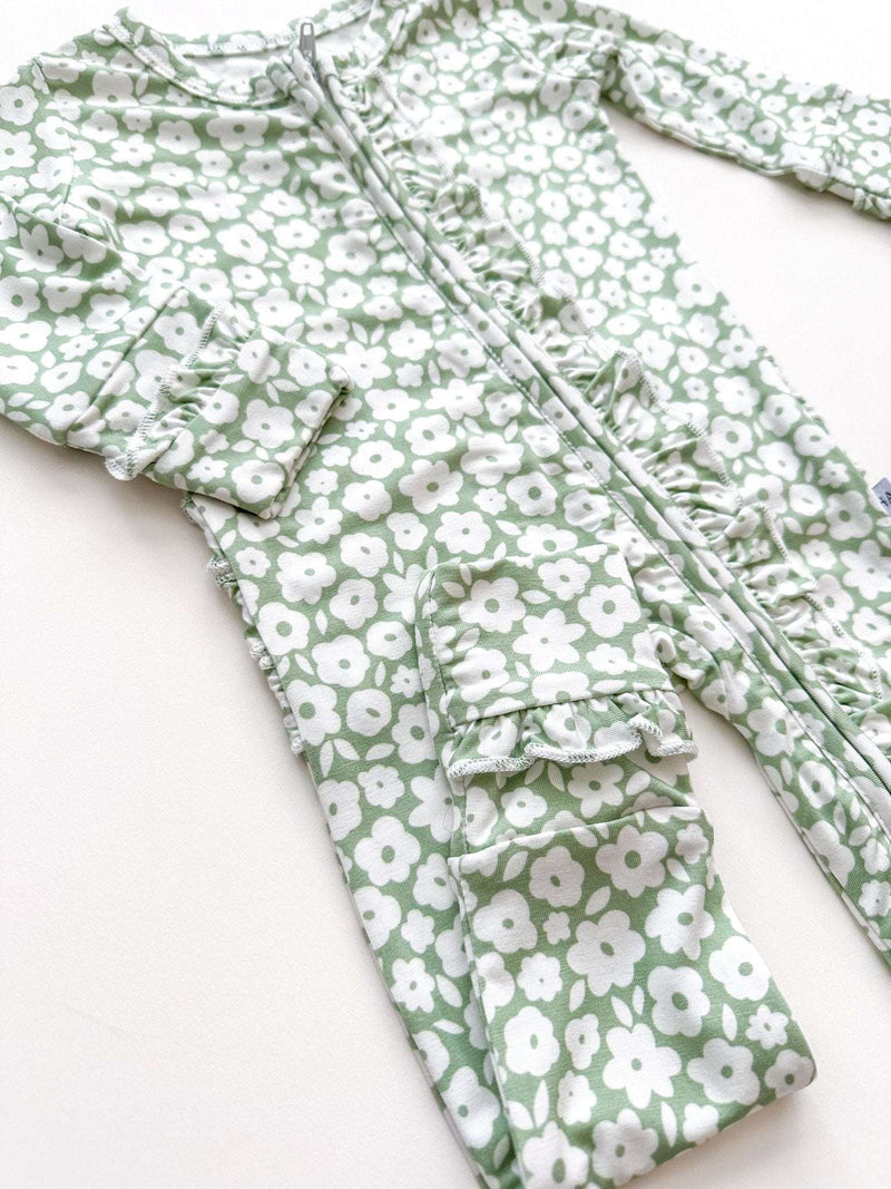 Ruffle Zipper One Piece in sage ditsy floral pattern with ruffle details and 2-way zipper closure.