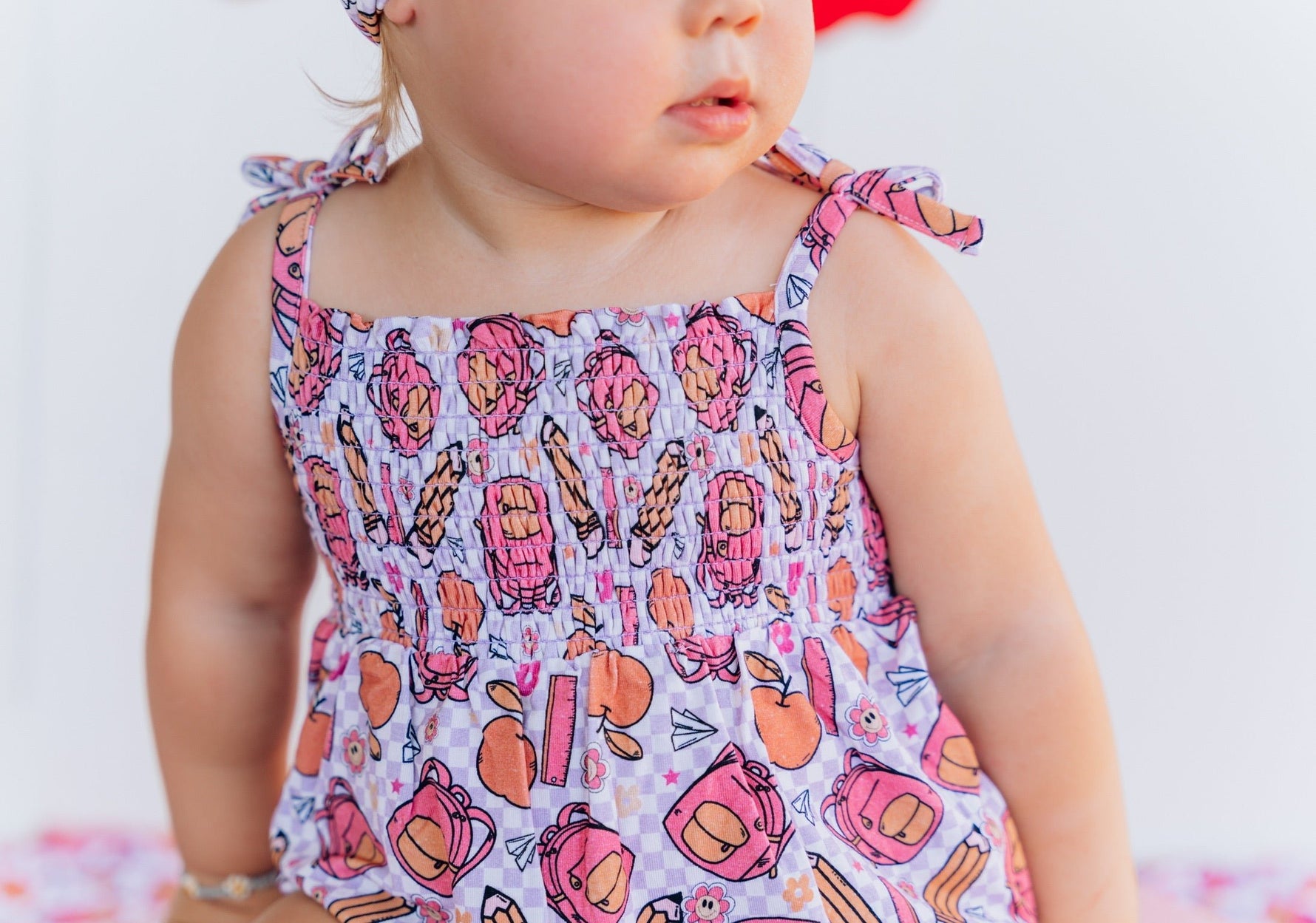 DREAM BIG LITTLE CO RULE THE SCHOOL SMOCKED BUBBLE ROMPEREveretts Place