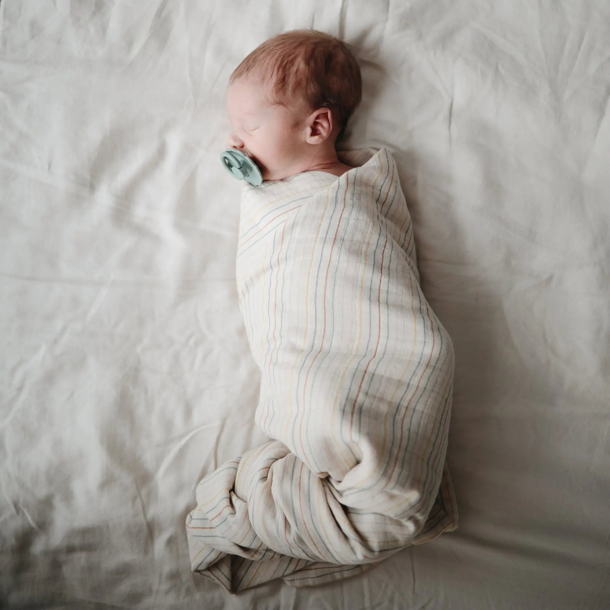 Organic Cotton Muslin Swaddle Blanket for Baby Cuddling and Nursing Mushie