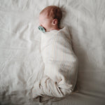 Mushie organic cotton muslin swaddle blanket