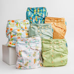 Abstract: Essentials Pocket Cloth Diaper with Athletic Wicking Jersey, Grows with your Baby - Everetts Place Boutique - Pocket Diaper
