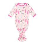 Baby knotted gown with overlap shoulder, tie bottom, and fold-over hand mittens in a sandy beach print.