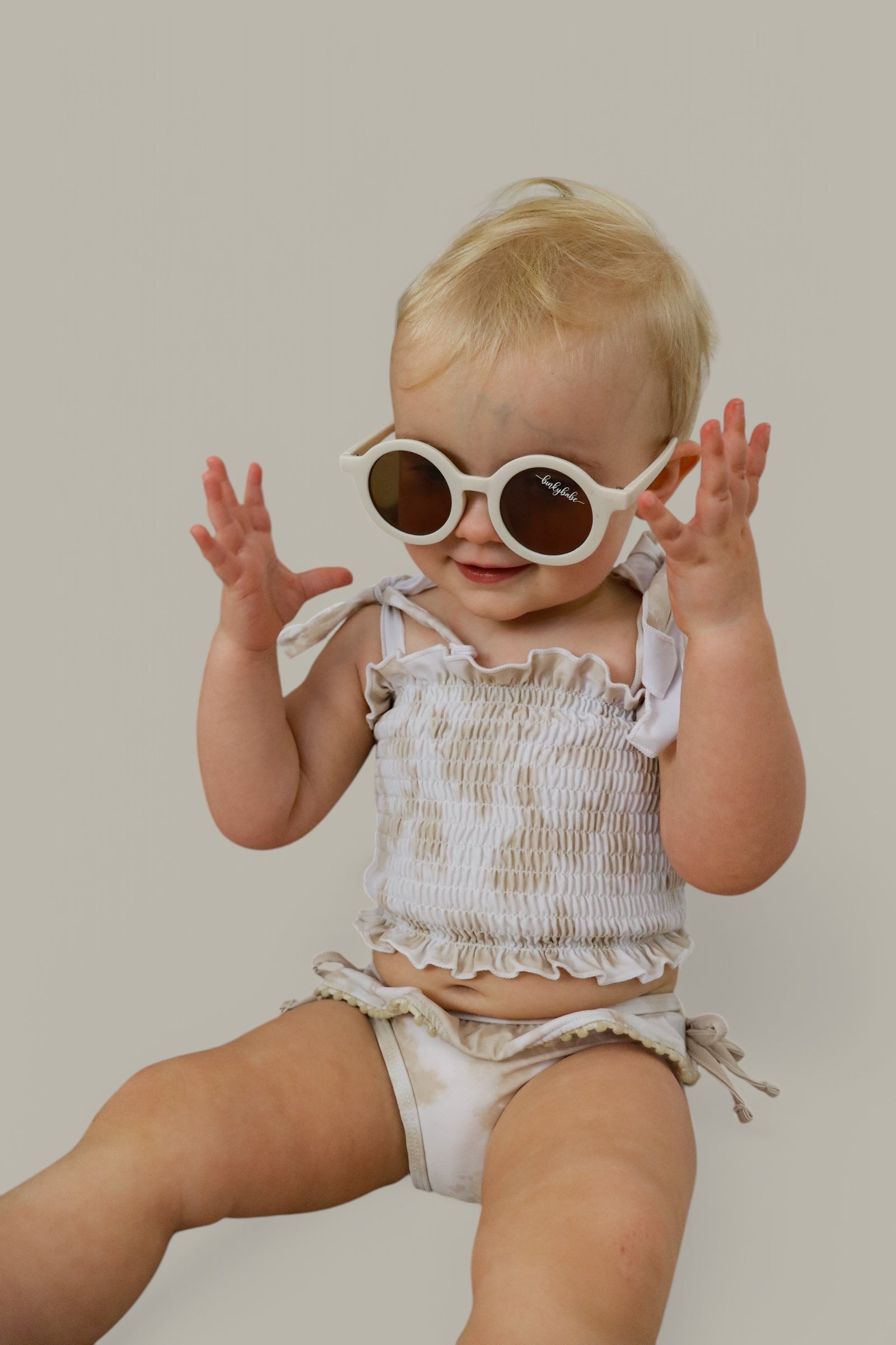 DREAM BIG LITTLE CO SANDY SHORES DREAM SMOCKED TWO PIECE SWIM SUITEveretts Place