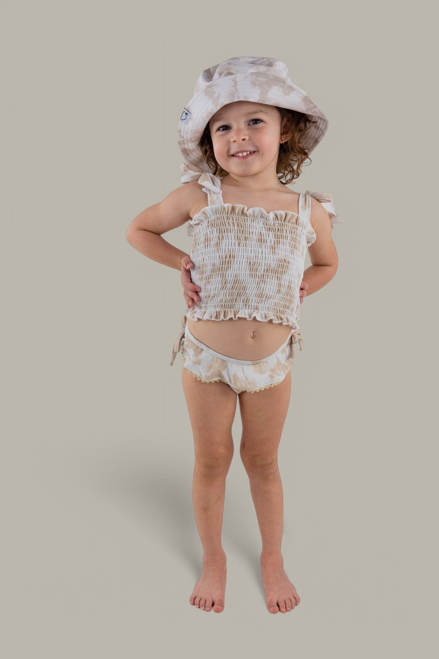 DREAM BIG LITTLE CO SANDY SHORES DREAM SMOCKED TWO PIECE SWIM SUITEveretts Place