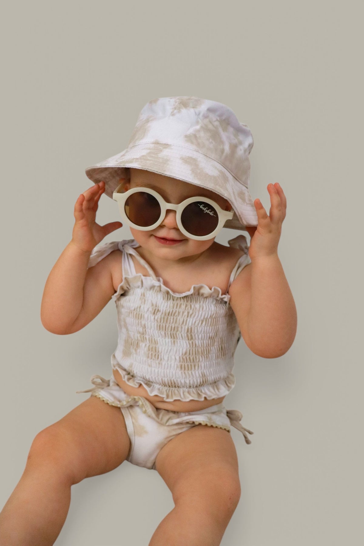 DREAM BIG LITTLE CO SANDY SHORES DREAM SMOCKED TWO PIECE SWIM SUITEveretts Place