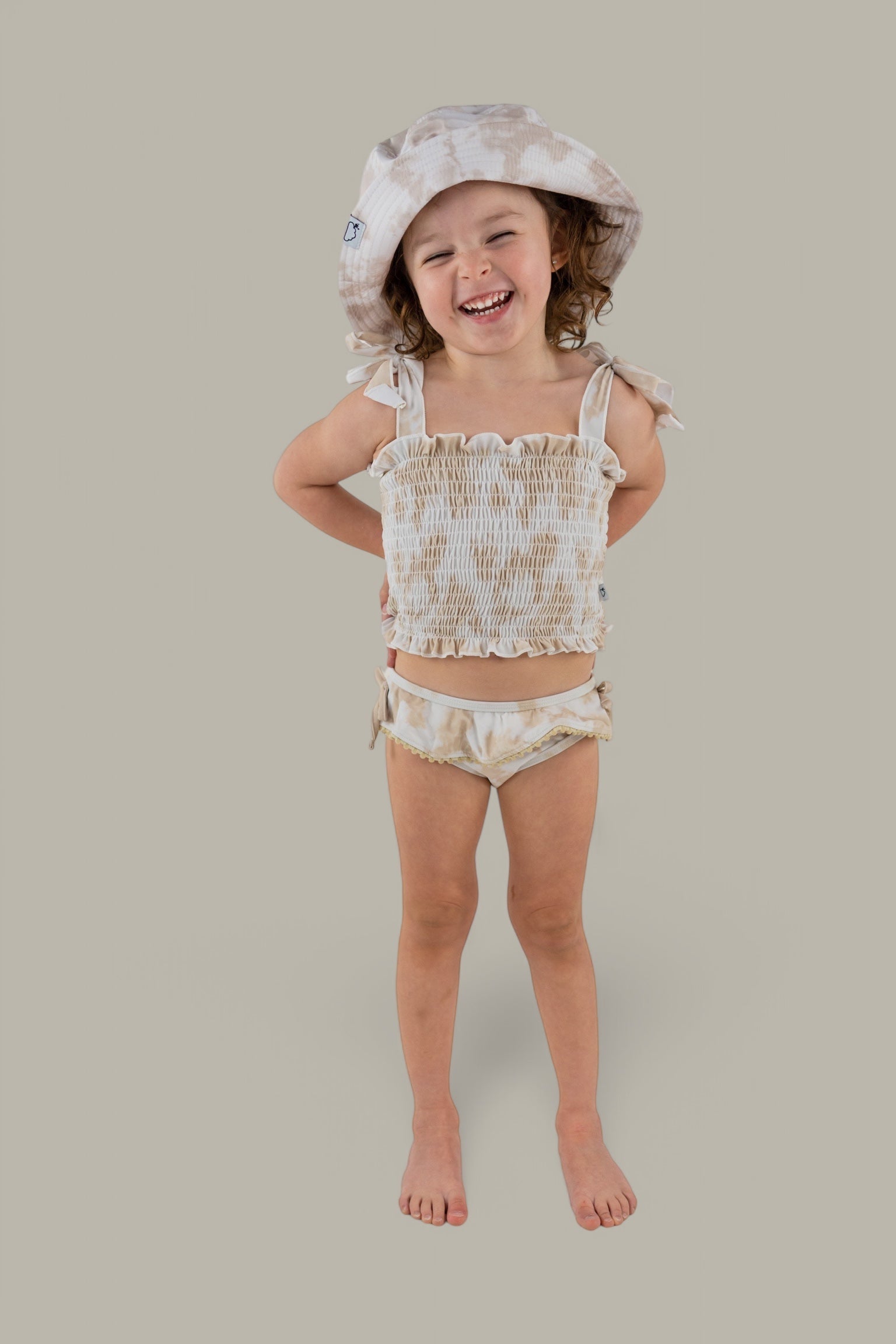 DREAM BIG LITTLE CO SANDY SHORES DREAM SMOCKED TWO PIECE SWIM SUITEveretts Place
