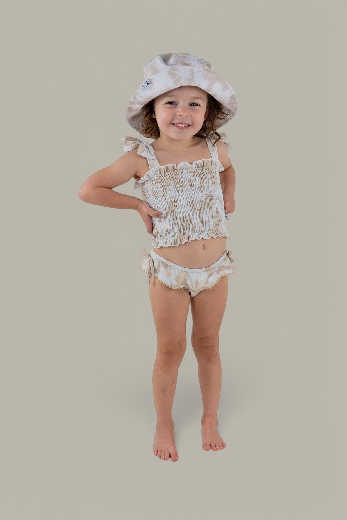 DREAM BIG LITTLE CO SANDY SHORES DREAM SMOCKED TWO PIECE SWIM SUITEveretts Place