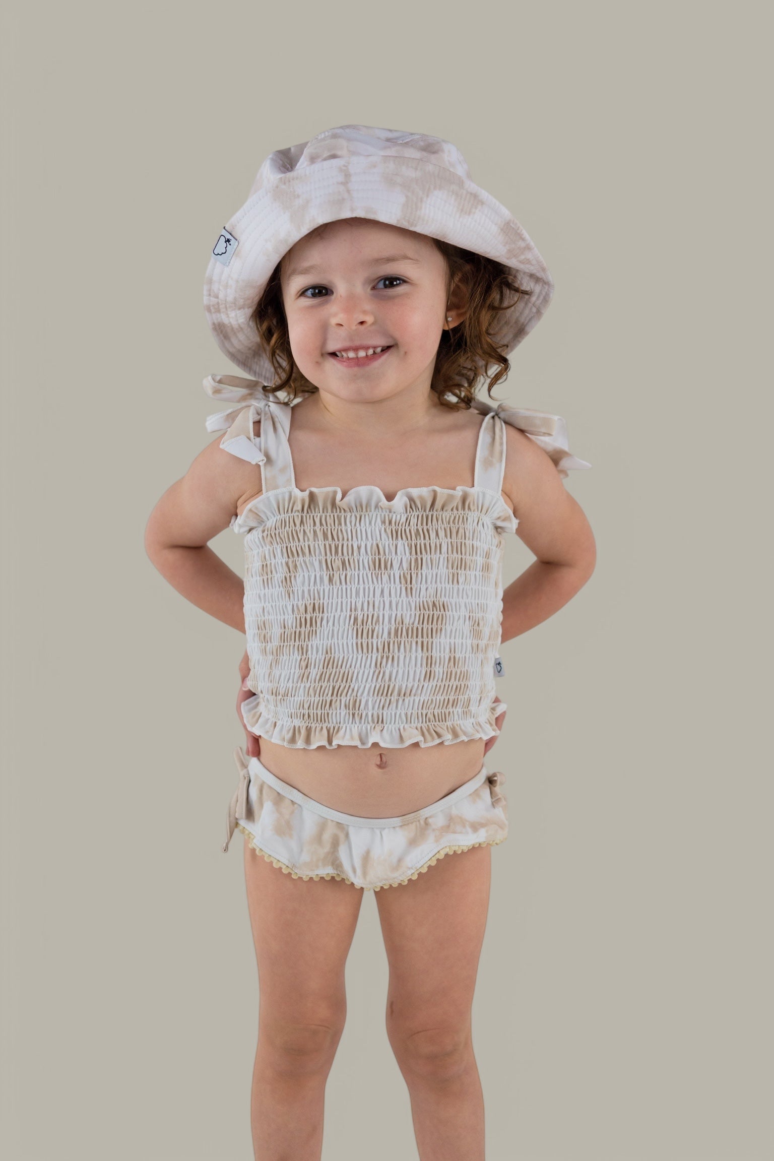 DREAM BIG LITTLE CO SANDY SHORES DREAM SMOCKED TWO PIECE SWIM SUITEveretts Place