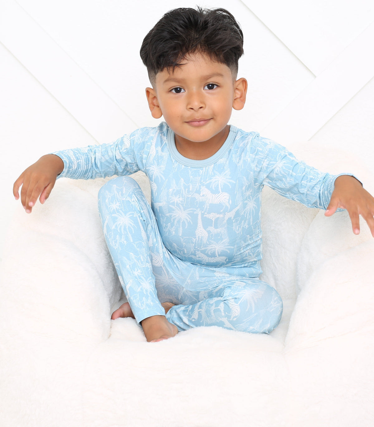 Two-piece long sleeve baby pajama set in Savanna blue print with matching pajama bottoms