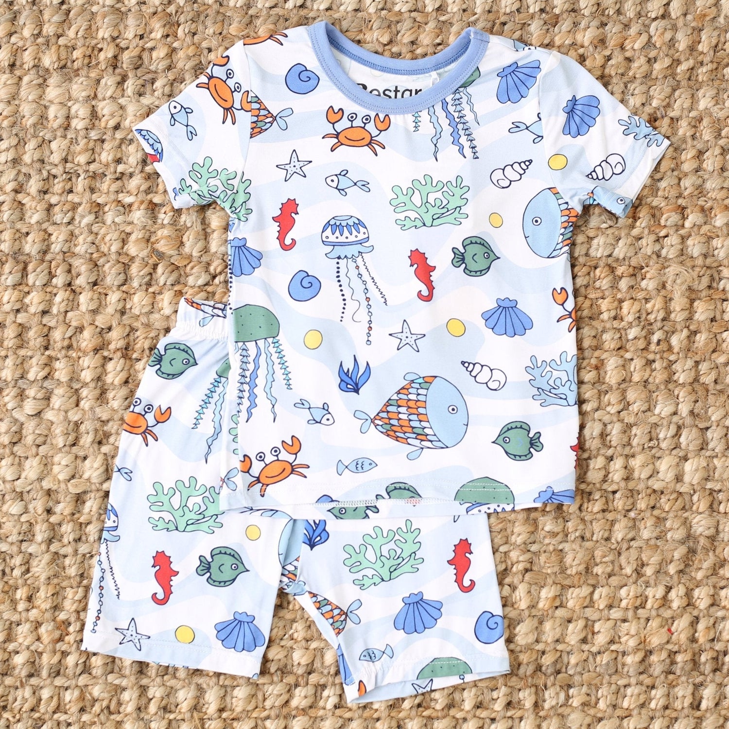 Baby shorts pajama set with sea swirl pattern, short sleeves and matching shorts