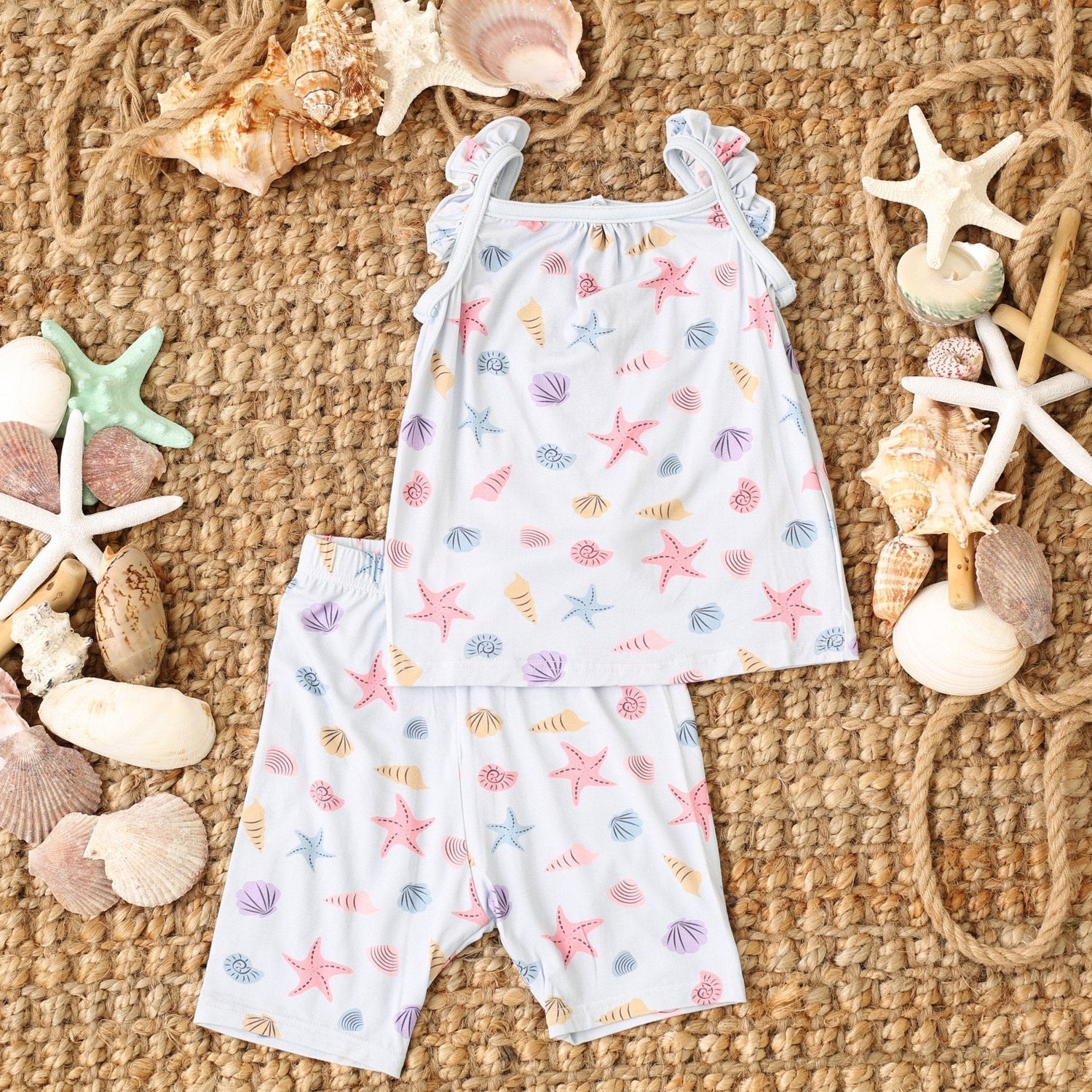 Flutter sleeve top and shorts pajama set in a seashell scout print for kids.