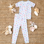 Short sleeve baby pajama set with pink and white seashell print top and matching pants