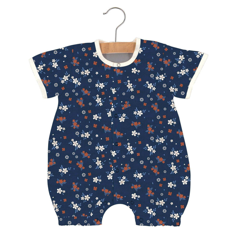 Serenity Floral Bamboo Newcastle Mini Romper in breathable muslin with snap leg openings.