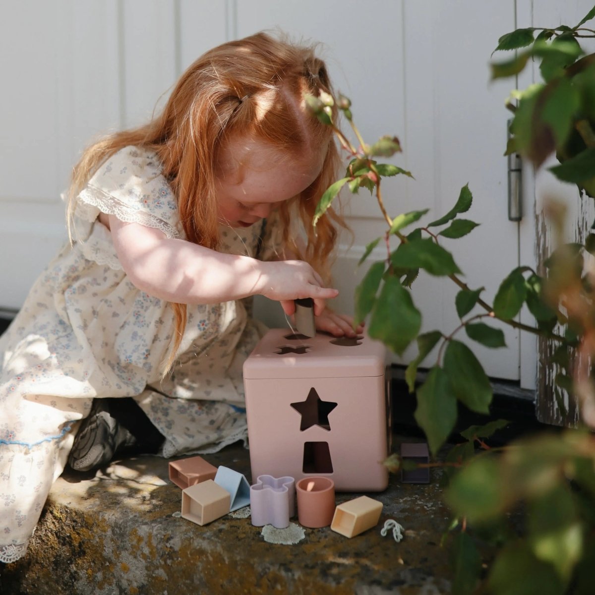 Mushie Shape Sorting Box for Kids Made in Denmark with 12 Soft Color Shapes for Fine Motor Skill Development -