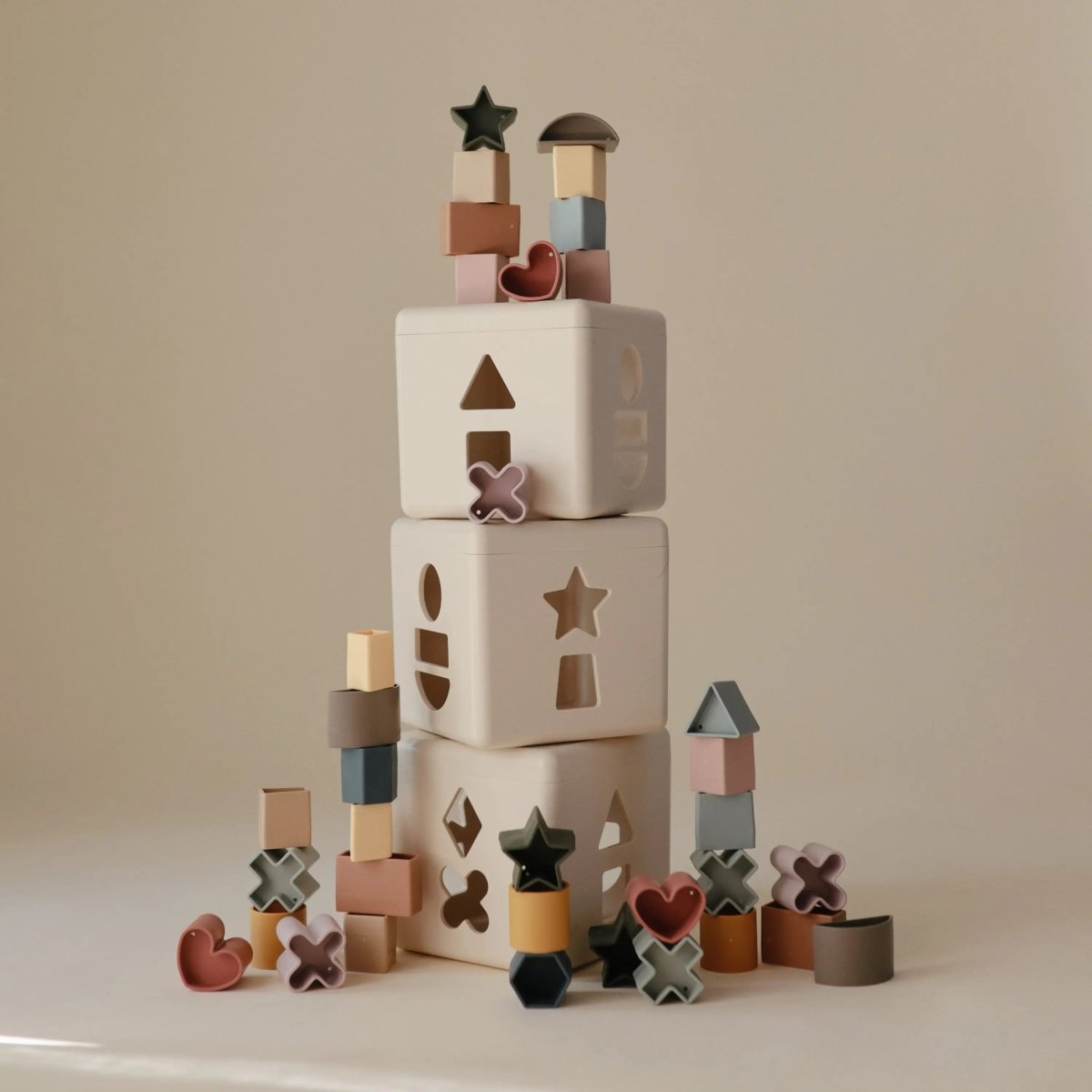 Mushie Shape Sorting Box for Kids Made in Denmark with 12 Soft Color Shapes for Fine Motor Skill Development -