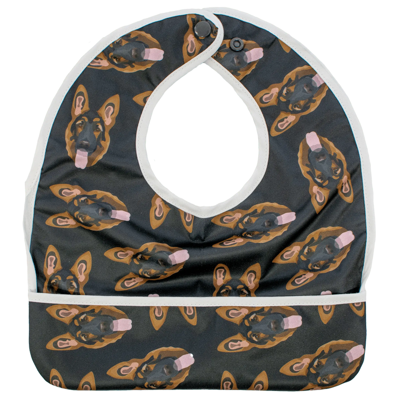 Shepard - The Flip Bib with food-catching pocket and dog pattern design.