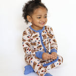 Baby zip romper in a pancake print with blueberries and strawberries, with fold-over feet.