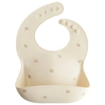 Mushie Silicone Baby Bib with Adjustable Neck Strap and Front Pocket for Easy Cleaning - Everetts Place Boutique - 