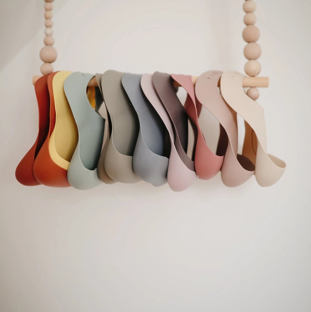 Mushie Silicone Baby Bib with Adjustable Neck Strap and Front Pocket for Easy Cleaning - 