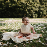 Mushie Silicone Baby Bib with Adjustable Neck Strap and Front Pocket for Easy Cleaning - 