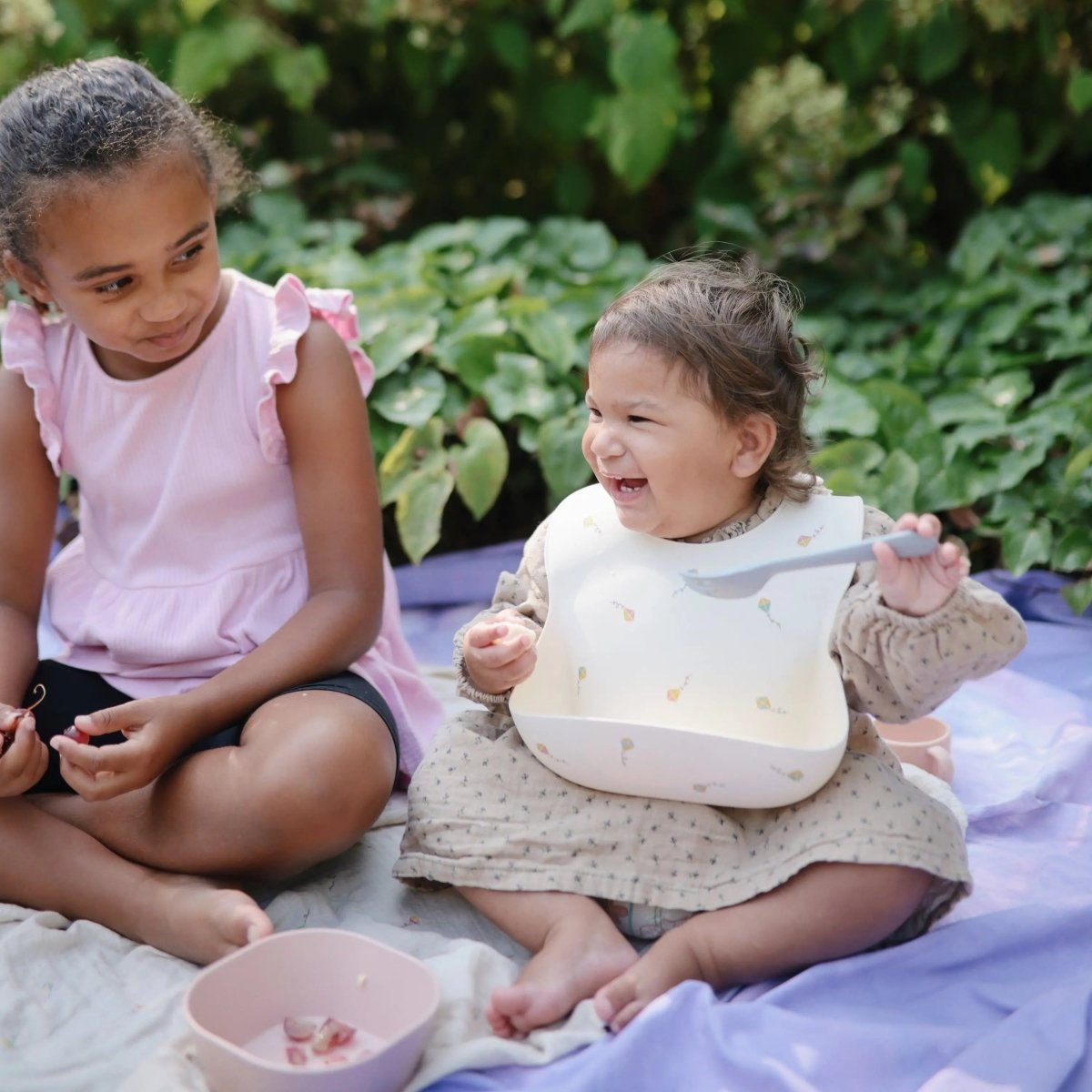 Mushie Silicone Baby Bib with Adjustable Neck Strap and Front Pocket for Easy Cleaning - 