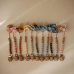 Mushie Silicone Pacifier Clip | Eva - 