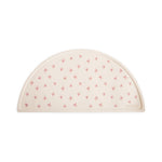 Mushie non-slip silicone placemat in a neutral color, designed for baby and toddler feeding