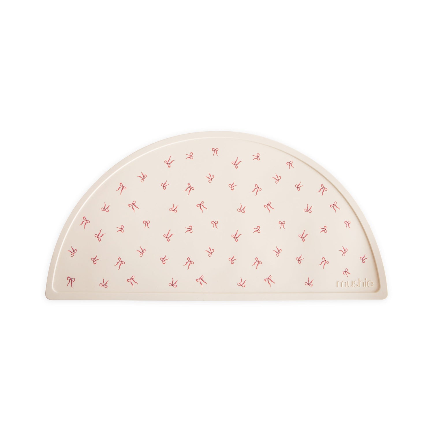 Mushie non-slip silicone placemat in a neutral color, designed for baby and toddler feeding