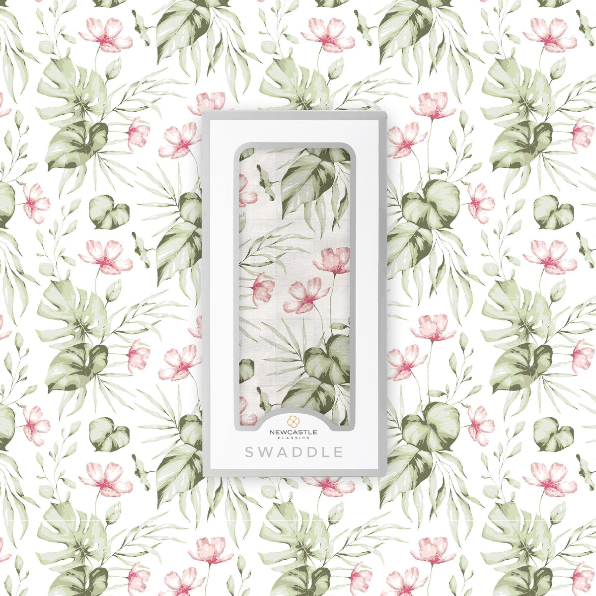 Soft organic baby swaddle blanket with a delicate silver pink orchid floral pattern, neatly folded.