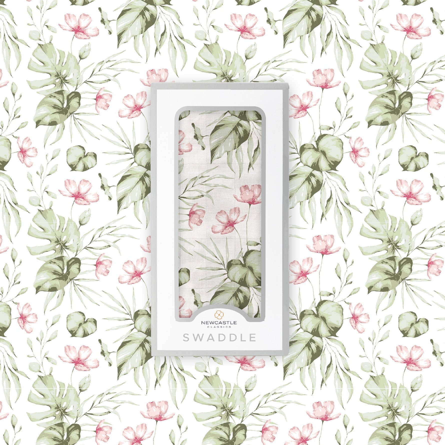 Soft organic baby swaddle blanket with a delicate silver pink orchid floral pattern, neatly folded.