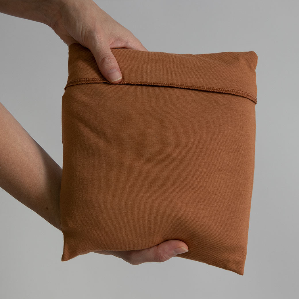 Modern Nursery organic cotton baby wrap, soft and breathable.