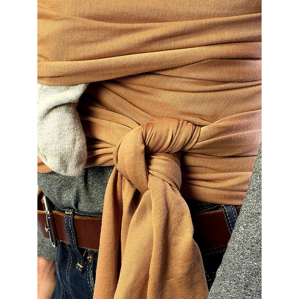 Soft organic cotton baby wrap by Modern Nursery for secure babywearing.