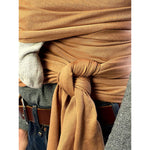 Soft organic cotton baby wrap by Modern Nursery for secure babywearing.