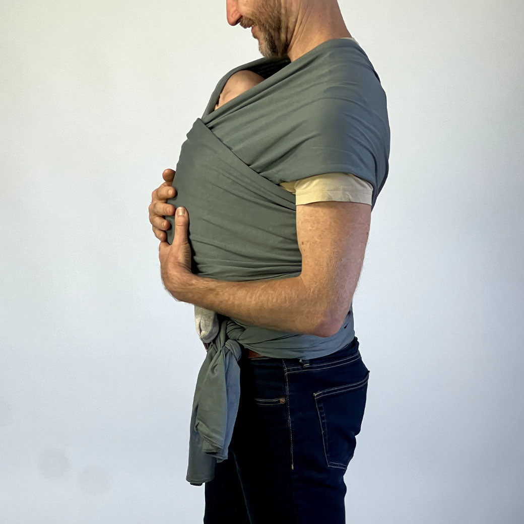 Modern Nursery organic cotton baby wrap for comfortable infant carrying.
