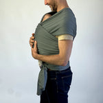 Modern Nursery organic cotton baby wrap for comfortable infant carrying.