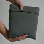 Modern Nursery organic cotton baby wrap for soft, secure infant carrying.