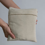 Modern Nursery organic cotton baby wrap. Soft, breathable, secure infant carrier.