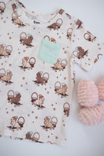 DREAM BIG LITTLE CO SKATING EGG HUNT DREAM POCKET TEEEveretts Place