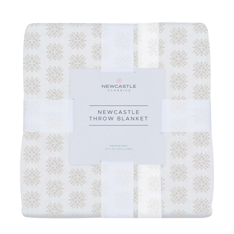 Flower Child Cotton Newcastle throw blanket in soft natural cotton muslin, 50” x 70”.