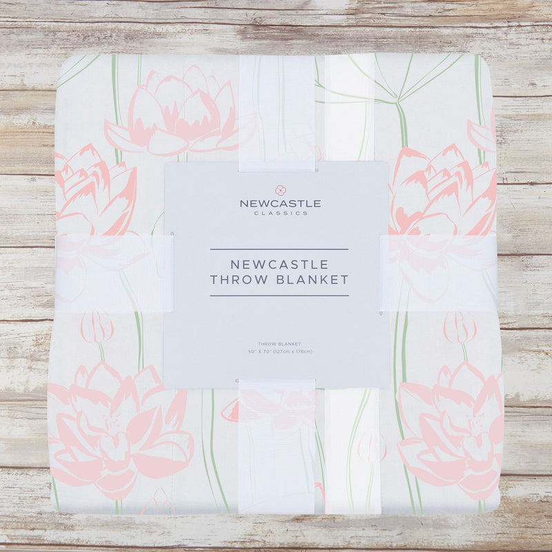 Water Lily Bamboo Throw Blanket with pink floral design, 100% bamboo muslin, size 50” x 70”.