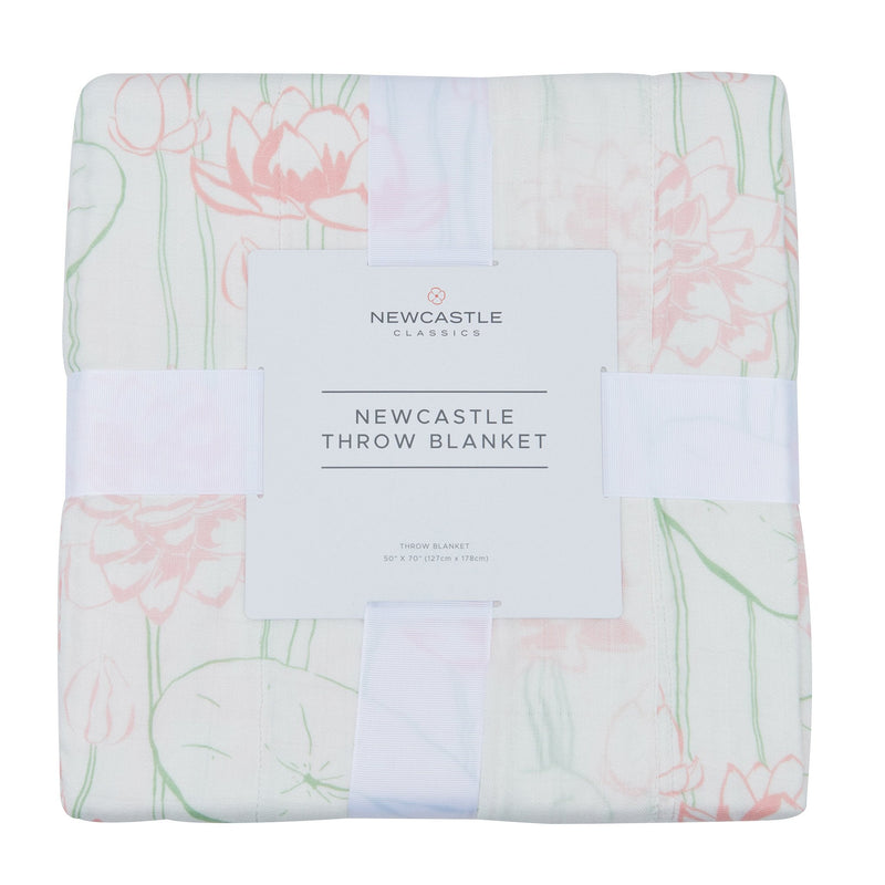 Water Lily Bamboo throw blanket with floral pattern, made from 100% natural bamboo muslin.