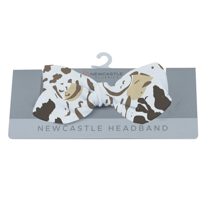 Animal print bamboo baby headband on packaging.