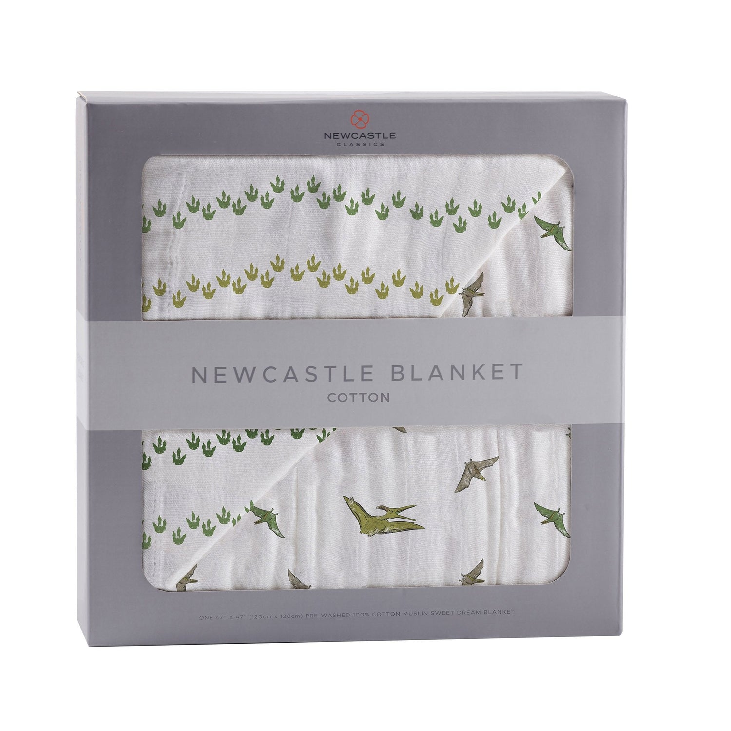 Cotton muslin baby blanket with dinosaur feet and pteranodon print in soft muted tones